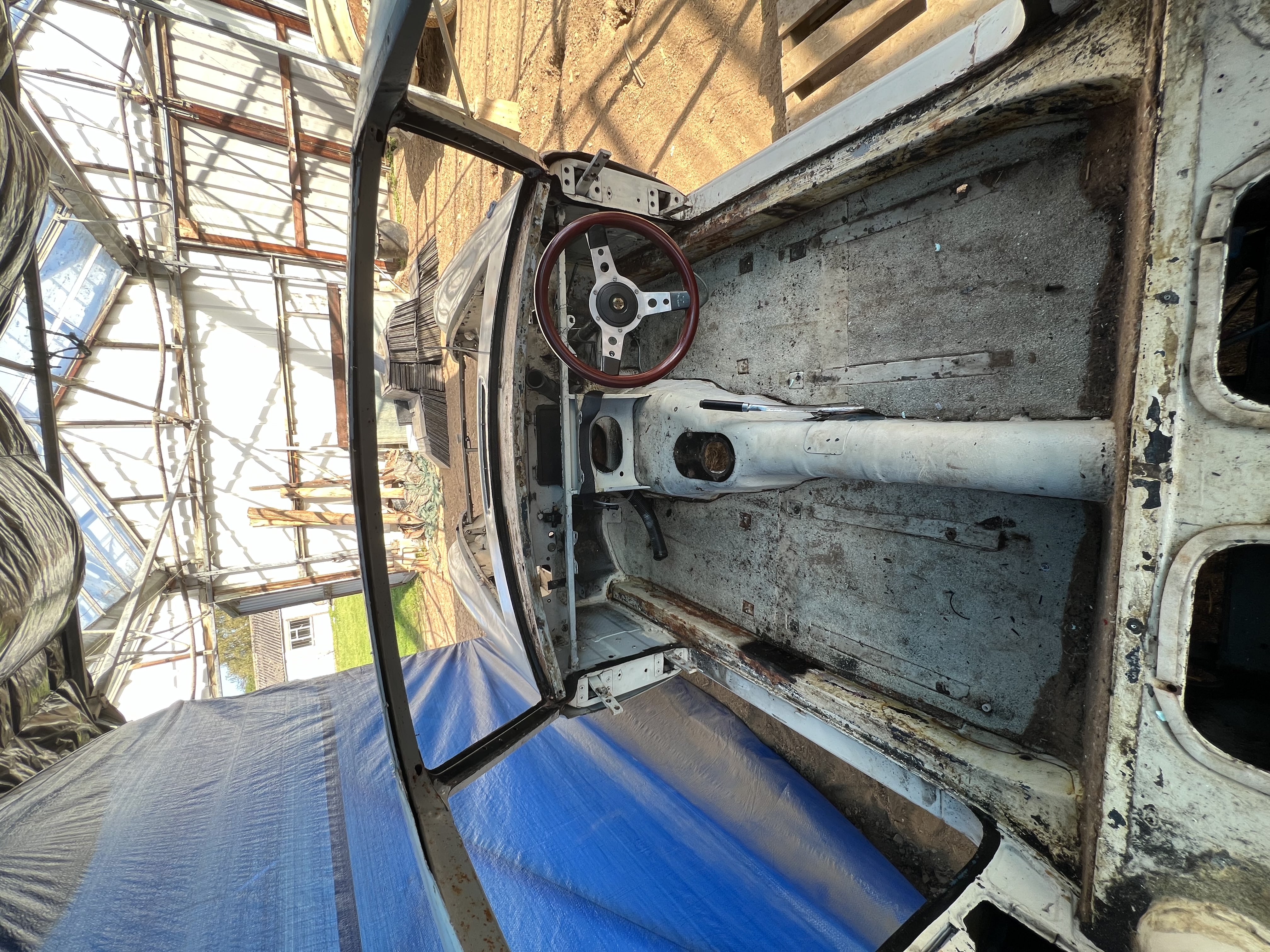 Interior shell of a stripped 1971 MGB GT during restoration