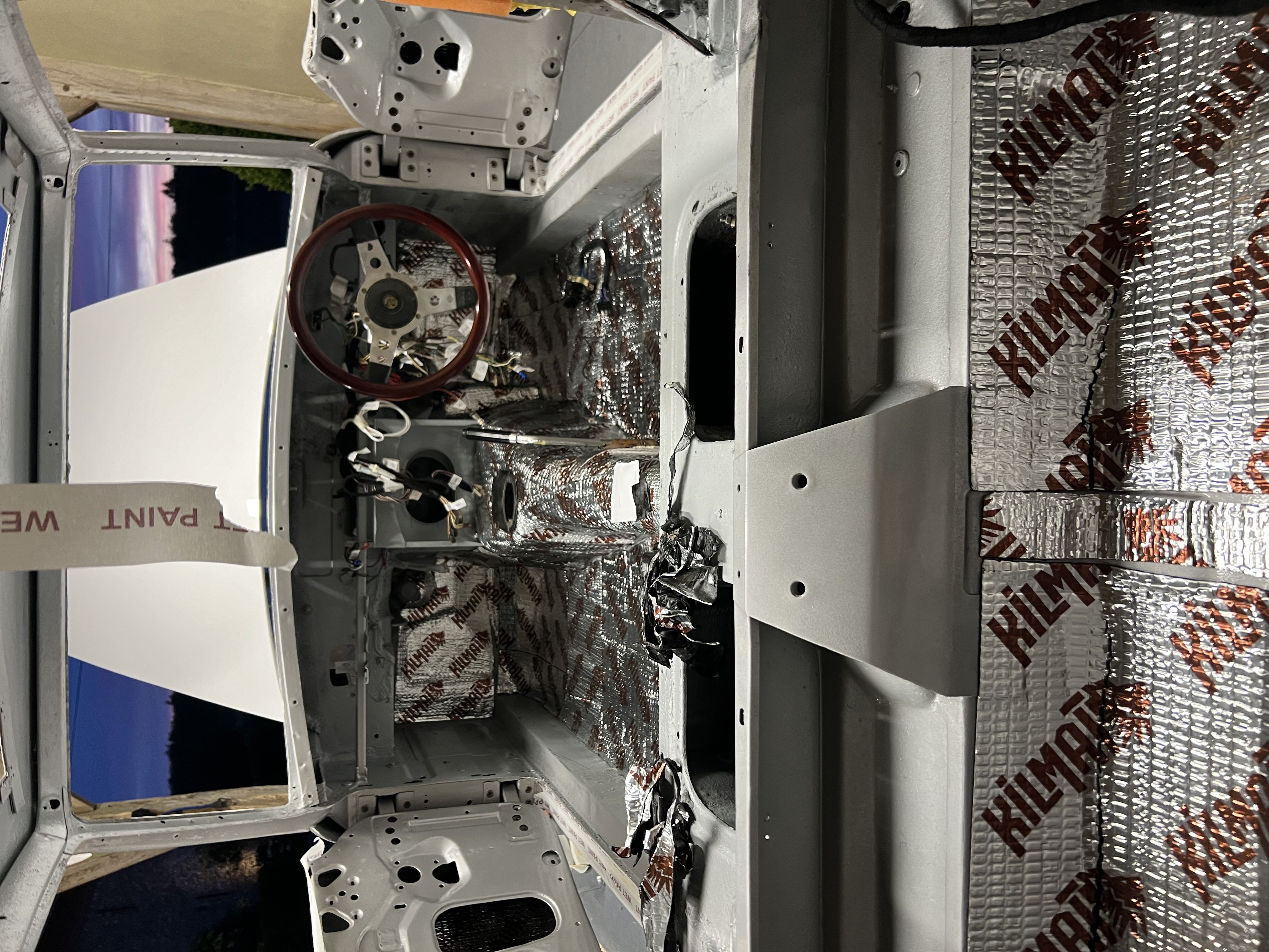 Restored interior shell of the MGB GT with sound deadening installed